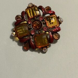 Beautiful broach/ pendant.  Can be worn with way